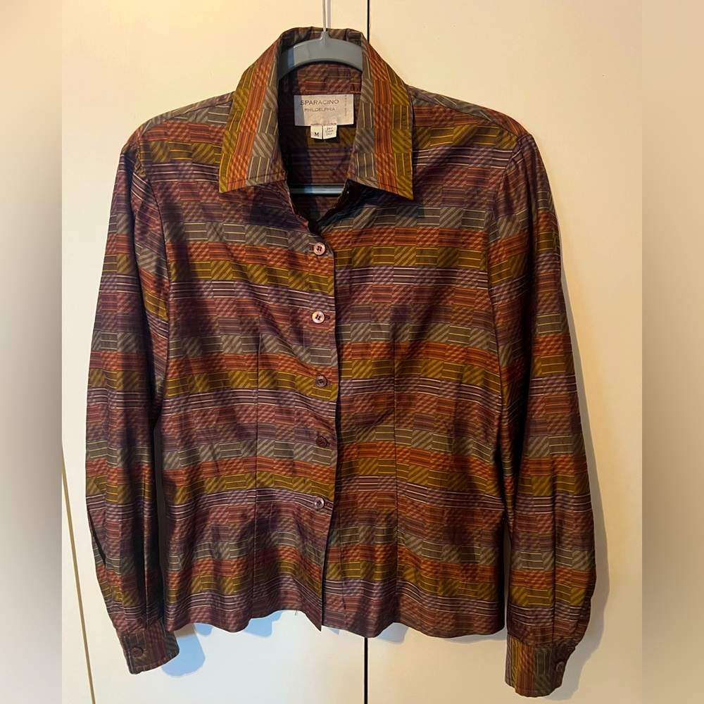 Sparacino designed Long sleeved blouse.